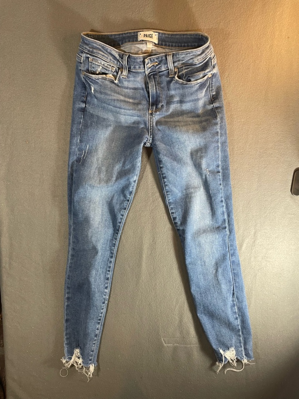 PAIGE Medium Blue Distressed Skinny Jeans with Frayed Hem